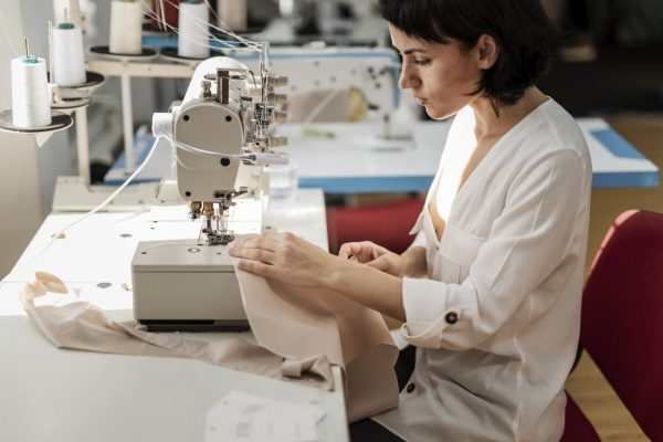 woman-working-with-sewing-machine